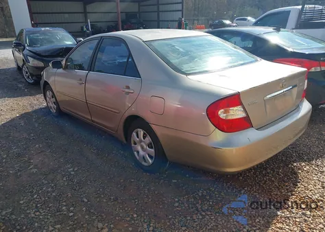 2003 Toyota Camry Le z USA, uszkodzony, nr VIN 4T1BE32K33U184725